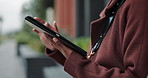 Tablet, hands and business person in city for information, news or check email notification. Technology, urban and professional outdoor closeup on internet with journalist reading report for feedback