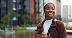 Black woman, smile or phone in city for business, email or positive feedback in New York. Entrepreneur, happy or mobile at office park for loan approval, startup funding or news for urban development