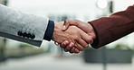 Professional, people and closeup with handshake in city for introduction, welcome or greeting. Corporate, B2B meeting and employee shaking hands at business park for company, negotiation or agreement