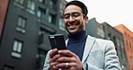 Business, Asian man and laugh outdoor with texting on smartphone for social media in New York. Male person, from below and happy with browsing internet for entertainment, networking or communication
