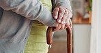 Hands, senior woman and cane with Arthritis, elderly care or wellness for health. Pensioner, person with disability and walking stick for age related illness, retirement home or rehabilitation clinic