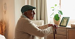 Elderly man, thinking and lonely in bedroom with picture frame, nostalgia memory and partner loss of empathy. Senior person, walking stick and check album, remember history and retirement home