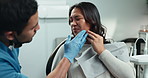 Toothache, patient and dentist for appointment, wellness and checkup in hospital or oral care clinic. Female person, pain with dental hygienist for teeth cleaning, root canal treatment or extraction