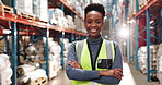 Logistics, portrait and black woman in warehouse with confidence, smile and trust in export distribution. Inventory management, pride and person in factory with arms crossed for inspection service