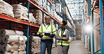 People, logistics and tablet in warehouse for inspection, compliance and safety training with walking. Manager, meeting and tech for supply chain industry, project briefing and inventory management