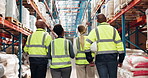 Team, logistics and walking in warehouse for inspection, compliance and safety training with back. People, discussion and tour for supply chain industry, project briefing and inventory management