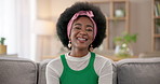 Sofa, smile and face of black woman in home for resting, relaxing and comfortable on weekend. Living room, apartment and portrait of happy person on couch with fashion, confidence and laughing