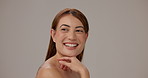 Skincare, beauty and woman in studio with natural, glow and face hydration treatment. Texture, cleanse and female person with health dermatology routine for facial elasticity by gray background.