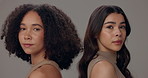 Women, hair care and together with face in studio, confident or back for beauty by background. People, girl and model with afro, hairstyle or cosmetic for results, glow and transformation in Colombia