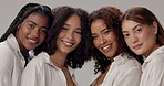 Women, inclusion and diversity in studio for beauty, solidarity and bonding together with hug, unity and smile. Friends, support and face on white background for natural, empowerment and confidence