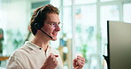 Man, celebration and happy in call center with computer, fist or bonus for performance, target or sales. Person, consultant or agent with cheers, winning or excited smile for success in telemarketing