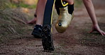 Running, nature and woman with prosthetic leg for workout, marathon training and exercise. Sports, athlete and person with disability start for wellness, health and performance on outdoor trail