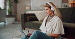 Woman, home and laptop with headphones for research with music in living room as blogger. Female person, freelance writer and remote work on website for lifestyle article, story and content in lounge