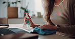 Sanitizer, cloth and woman wipe keyboard in office for bacteria, germs or dirt prevention. Hygiene, health and hands of female person cleaning technology equipment for dust at desk in workplace.