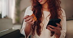 Woman, hands and phone with pills for medical research, symptoms or reading side effects on sofa at home. Closeup, female person or patient with medication on mobile smartpone for telehealth at house