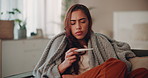 Sick woman, thermometer and sofa with blanket for fever, illness or cold and flu at home. Frustrated, female person or patient with viral infection, virus or symptoms for allergy, sinus or influenza