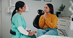 Women, dentist and happy with patient for dental surgery in clinic for teeth whitening and treatment with doctor. Female patient, satisfied and smile on consultation for canal procedure and oral care