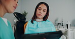 Women, dentist and tablet with patient for dental surgery in clinic for teeth whitening and treatment options. Hygiene, discussion and dentistry on consultation for canal procedure and oral care xray