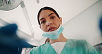 Woman, dentist and tooth surgery with tools for dental care, cavity or gingivitis at clinic. POV, female person or young orthodontist with light or equipment for cleaning teeth, extraction or implant