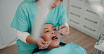 Women, dentist and patient with dentures for oral care teeth hygiene, treatment and removal. Doctor, surgeon and above on consultation for extraction at medical clinic on canal procedure or surgery