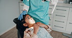 Dentist, child and anxiety in office for surgery, dental care or support in light. Orthodontist, young girl or scared in practice for consultation, fear or expert for procedure for braces or cavities