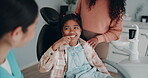 Child, dentist or brushing teeth tutorial for care with support, help or advice in practice. Young girl, orthodontist or happy in office for dental hygiene, consultation or patient with mom for trust