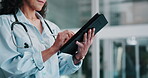 Hands, doctor and woman on tablet for research article, results and info in hospital. Technology, pen and medical worker on internet for telehealth update, healthcare report or writing email closeup