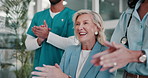 People, medical team and congratulations with applause in meeting for healthcare or success at hospital. Doctor, surgeon or group of health professionals clapping for winning or promotion at clinic