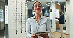 Face, tablet and welcome with optometrist woman in eyewear store for checkup or consultation. Assessment, glasses and portrait of person laughing in optometry clinic for healthcare, service or vision