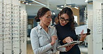 Women, optometrist and consultation with tablet at store for eye exam results, glasses prescription and lens information . People, digital and communication for assessment, schedule and frame choice