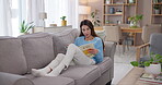 Mature woman, reading book or calm on sofa for hobby, fictional tale or adult literature at home. Lecturer, comfort or peace in living room with novel, knowledge or curriculum preparation for school