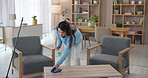 Cleaner, woman and wipe table with disinfectant for spring cleaning, bacteria and household maintenance in home. Housekeeping, person and liquid chemical for dirty surface, hygiene and dust in house