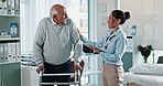 Woman, doctor and tablet with patient on walker in elderly care for physiotherapy, recovery or rehabilitation at hospital. Female person, physiotherapist and senior with stroller for walking aid