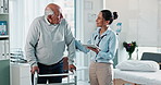 Woman, doctor and tablet with walker in elderly care for physiotherapy, recovery or rehabilitation at hospital. Female person, physiotherapist and senior patient with stroller for walking development