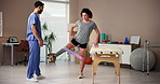 Balance, prosthetic or resistance band with patient and physiotherapist in office for recovery or rehabilitation. Exercise, strength training and amputee woman with consultant man in therapy clinic