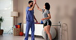 Exercise, high five or prosthetic with patient and physiotherapist in office for recovery or rehabilitation. Balance, smile or success with amputee woman and consultant man in physical therapy clinic