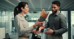 Development, woman and man in lab with prosthetic leg, research and innovation in robotic science. Future technology, medical engineering and team with product solution for artificial limb design