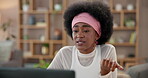 Black girl, video conference and conversation on laptop with online course or lesson for communication in home. Woman, tech and talking in house for content creation, education or learning as student