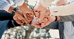 Senior people, hands and outdoor circle for motivation, training and together for workout progress. Group, teamwork and fist pump celebration in retirement, low angle and support for exercise goals