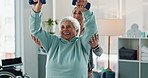 Happy woman, physiotherapist and weightlifting with dumbbells for exercise or therapeutic technique at clinic. Female person, therapist and physical therapy with senior patient for recovery session