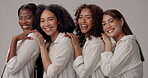 Women, happy and diversity in studio for beauty, solidarity and bonding together with row, unity and face. Friends, support and inclusion on white background for natural, empowerment and confidence