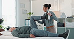 Woman, physiotherapist and stretching body with patient for physical therapy, muscle exercise or recovery at clinic. Female person, therapist and elderly man with knee injury, joint pain or ache