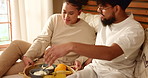 Couple, hugging and breakfast on bed in home for nutrition, healthy meal and bonding on holiday. Morning, people and food in bedroom with cereal, fruit and orange juice for wellness, brunch and diet