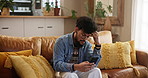 Man, smartphone and upset as frustrated, sad or disappointed on social media on weekend or sofa. Male person, technology and home with stress, fail or anxious for reading, scroll or online dating app