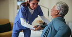 Nurse, senior woman and help in home for support, health or community care. Medical caregiver, retirement or geriatric patient with disability in rehabilitation for recovery, healing or holding hands