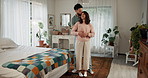 Dance, kiss and pregnant with couple in bedroom of home together for family planning or romance. Hug, marriage or pregnancy with happy man and woman in apartment for love, support or wellness