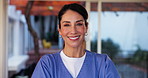 Face, happy woman and confident caregiver at nursing home with experience in healthcare service. Volunteer, portrait and nurse with smile or pride for job opportunity and career growth for support