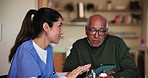 Tablet, consultation and nurse with senior man in assisted living facility for healthcare checkup. Technology, medical and caregiver with elderly patient for diabetes treatment in nursing home.