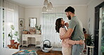 Pregnancy, kiss and dance with couple in bedroom for music, happiness and celebration. Smile, support and marriage with man and pregnant woman at home for milestone, partnership and care together