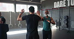 Coach, high five and fitness in group at gym for training, people or celebration for goal at club in retirement. Person, elderly men and women for diversity with success, exercise or cheers in class